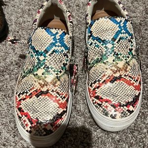 Steve Madden multi color snake skin slip- on shoes. I prefer more of a platform
